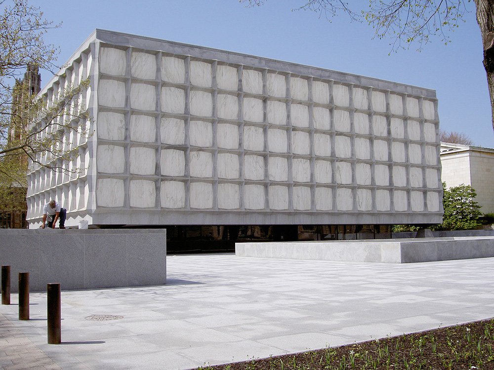 Beinecke Library seen across the plaza, with pale marble panels held in a deep exterior grid
