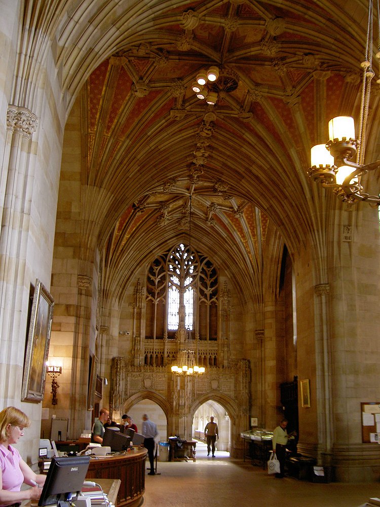 The circulation desk in Sterling Memorial Library, positioned at the end of the nave