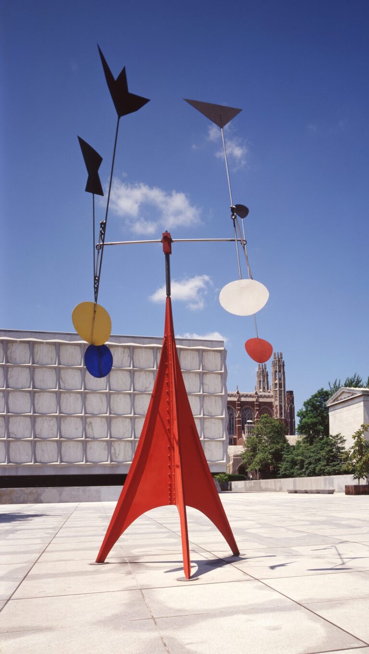 Gallows and Lollipops by Alexander Calder, a tall standing mobile with a red support frame and suspended colored metal plates